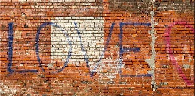 Use the healing brush tools to remove unwanted Graffiti in Photoshop